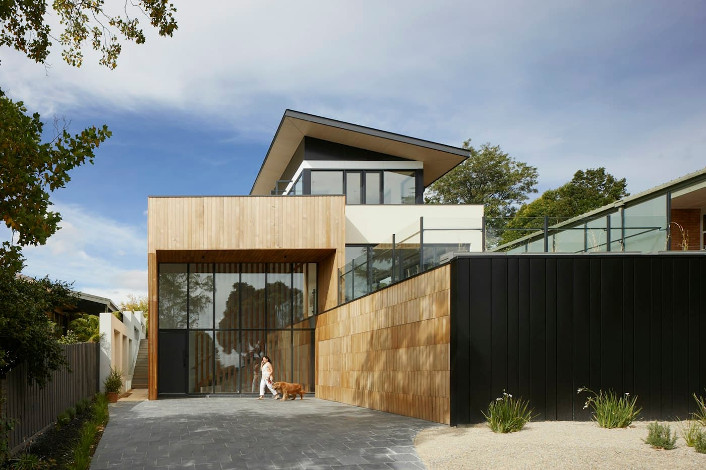 Finished modern home with wood and black cladding